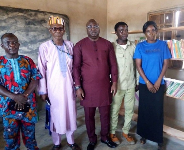 NYSC Member Donates Library to Host Community